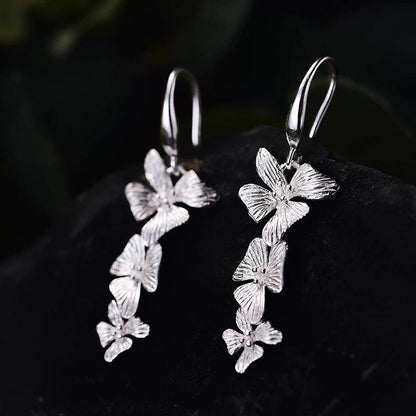 Boucles d'oreilles orchidées pendantes | Argent 925 détails plaqué Or 18K