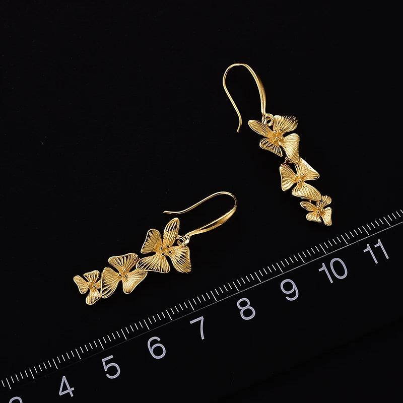 Boucles d'oreilles orchidées pendantes | Argent 925 détails plaqué Or 18K