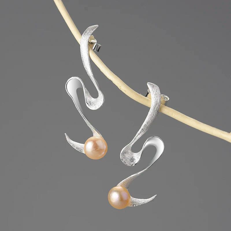 Boucles d'oreilles perle véritable sur spirale | Argent 925 détails plaqué Or 18k