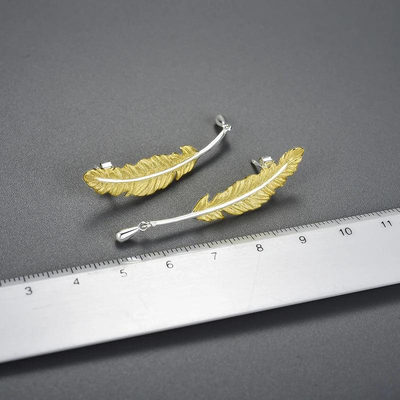 Boucles d'oreilles plumes dorées | Argent 925 détails plaqué Or 18K